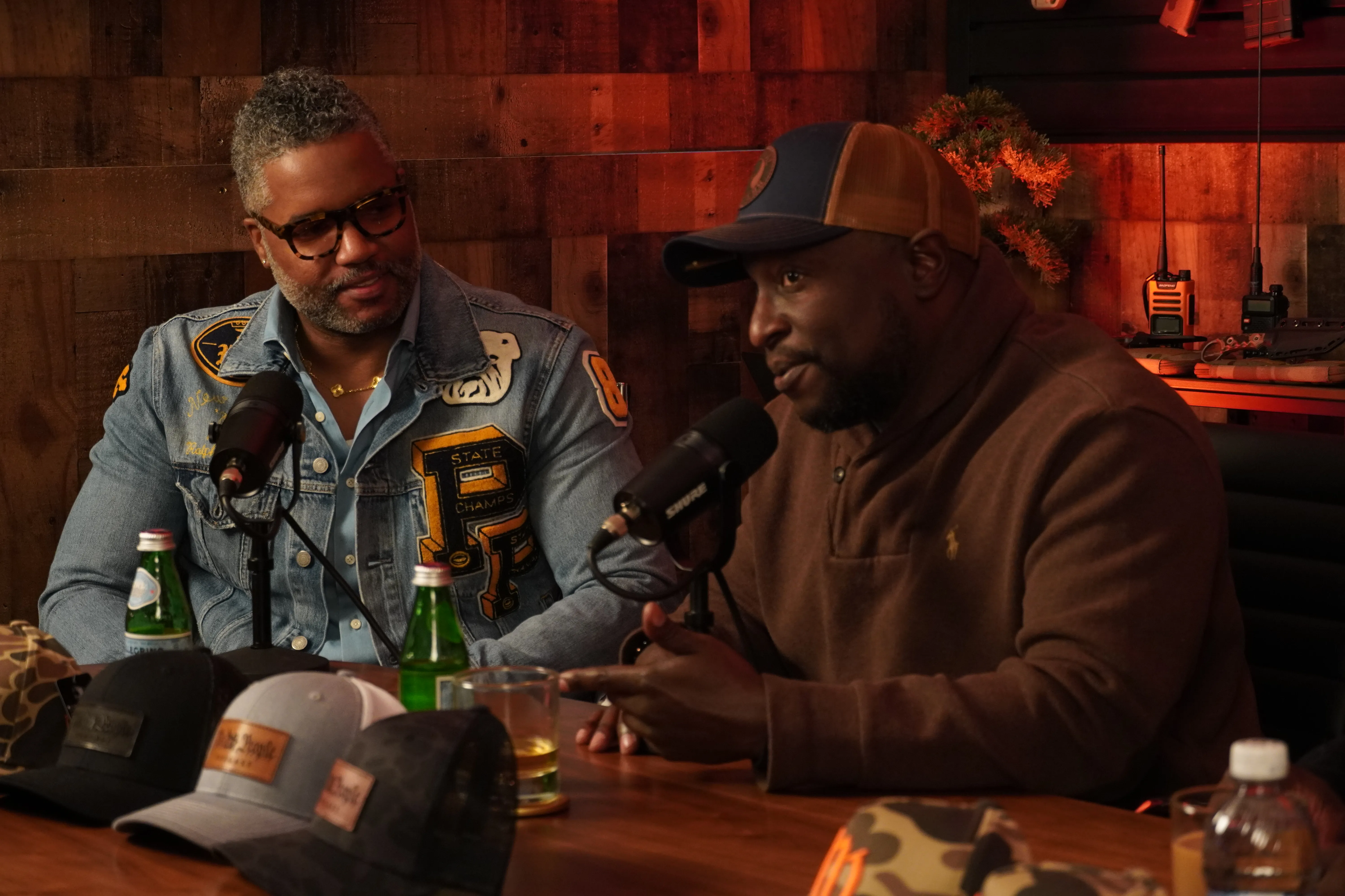 Hosts in conversation during a podcast recording